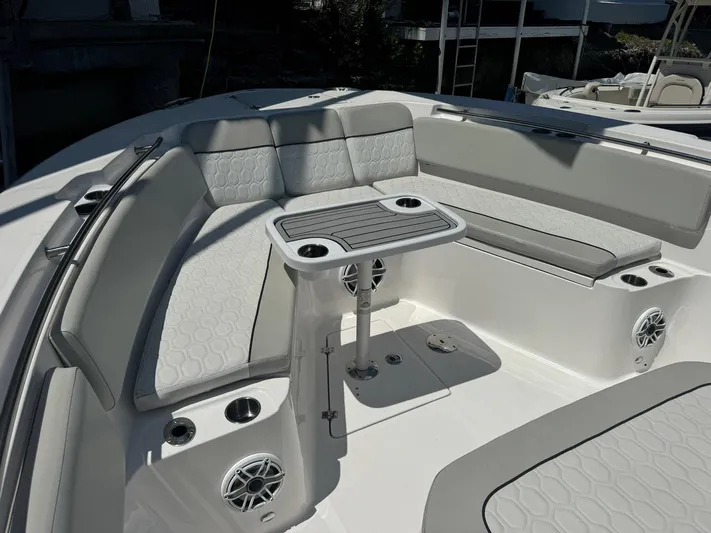  Yacht Photos Pics 2022 Sea Fox 328 Commander boat interior with seating and table.