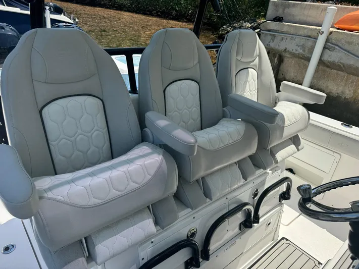  Yacht Photos Pics Luxury seating on 2022 Sea Fox 328 Commander boat, featuring plush, ergonomic design.