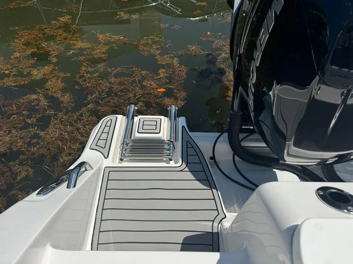  Yacht Photos Pics 2022 Sea Fox 328 Commander boat with swim platform and ladder.