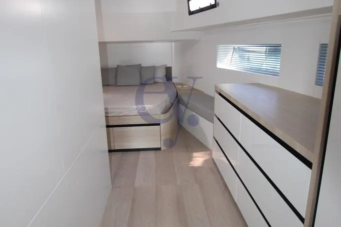 L Yacht Photos Pics Modern interior of 2023 MandaYachts Manda S05 with sleek design and ample storage.