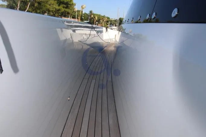 L Yacht Photos Pics 2023 MandaYachts Manda S05 yacht deck with sleek design and wooden flooring.