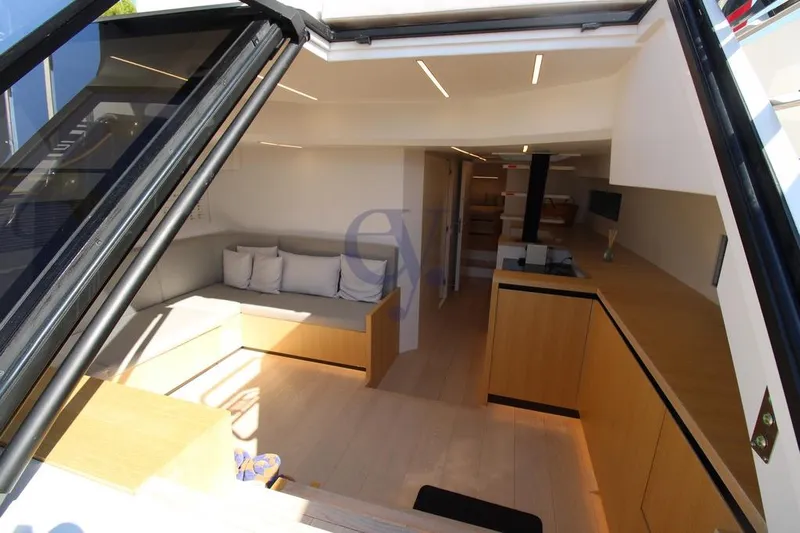 L Yacht Photos Pics Luxurious interior of 2023 MandaYachts Manda S05, featuring modern design and comfortable seating.
