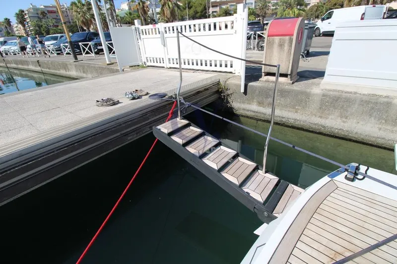 L Yacht Photos Pics Gangway of 2023 MandaYachts Manda S05 docked at marina.