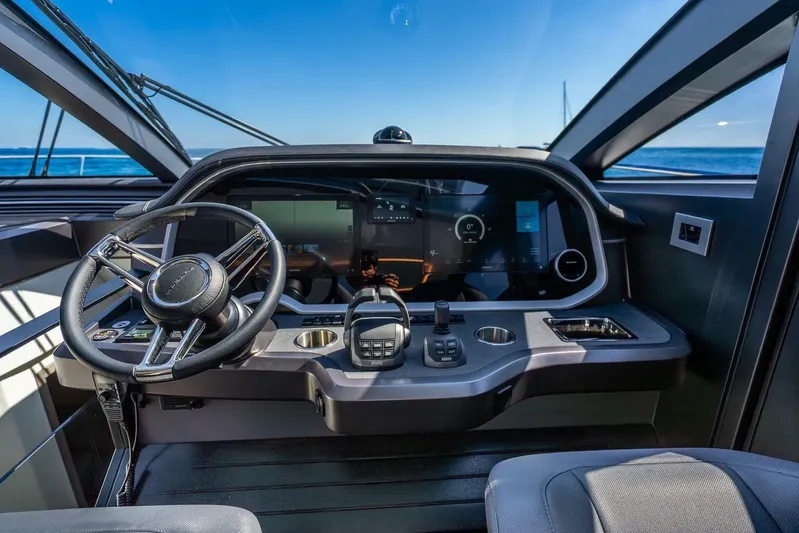  Yacht Photos Pics Cockpit of 2025 Pearl 63 yacht with modern steering and digital controls.