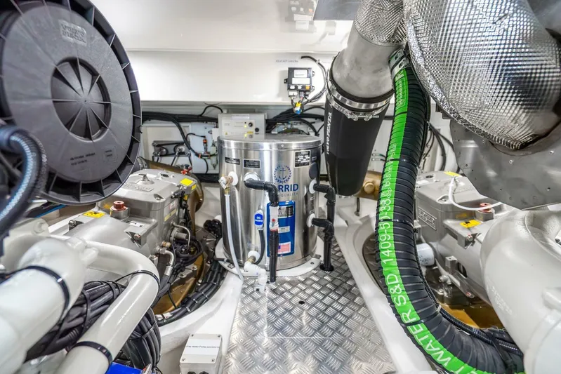  Yacht Photos Pics Engine room of 2025 Pearl 63 yacht with advanced machinery and equipment.