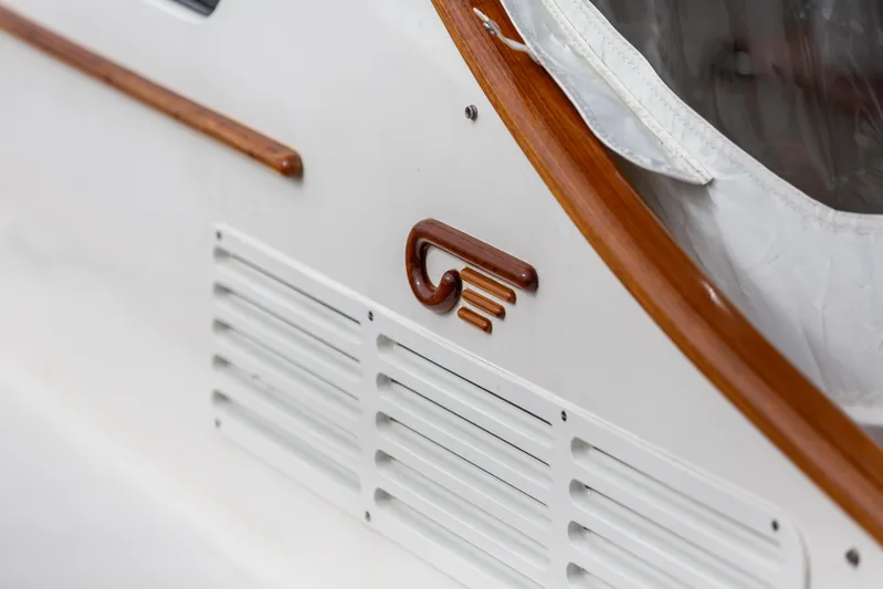 Golightly Yacht Photos Pics 2023 Hinckley Picnic Boat 34 S, featuring elegant wood accents and sleek design details.