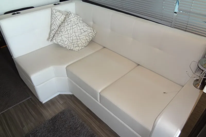 Imagine Yacht Photos Pics Luxurious white leather seating in 2021 Cruisers Yachts 50 Cantius interior.