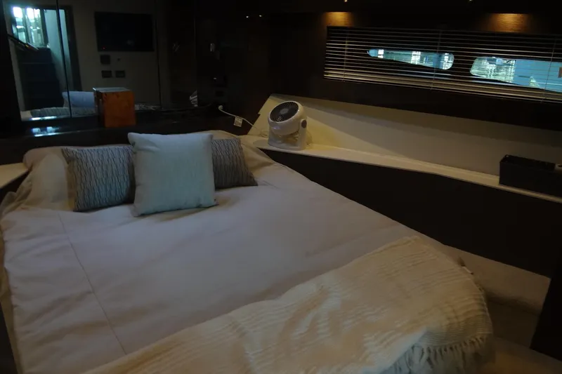 Imagine Yacht Photos Pics Luxurious bedroom interior of 2021 Cruisers Yachts 50 Cantius with modern decor.