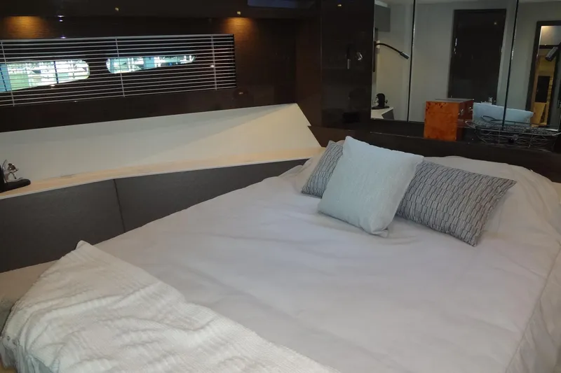 Imagine Yacht Photos Pics Luxurious bedroom interior of 2021 Cruisers Yachts 50 Cantius with modern decor.