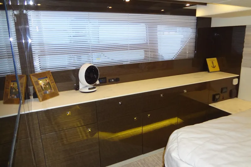 Imagine Yacht Photos Pics Luxurious interior of 2021 Cruisers Yachts 50 Cantius with sleek cabinetry and modern decor.