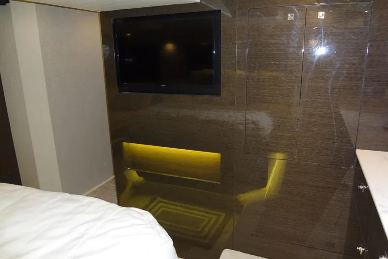 Imagine Yacht Photos Pics Luxurious interior of 2021 Cruisers Yachts 50 Cantius with TV and modern design.