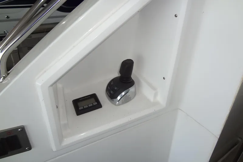 Imagine Yacht Photos Pics Control panel of 2021 Cruisers Yachts 50 Cantius, featuring joystick and display.