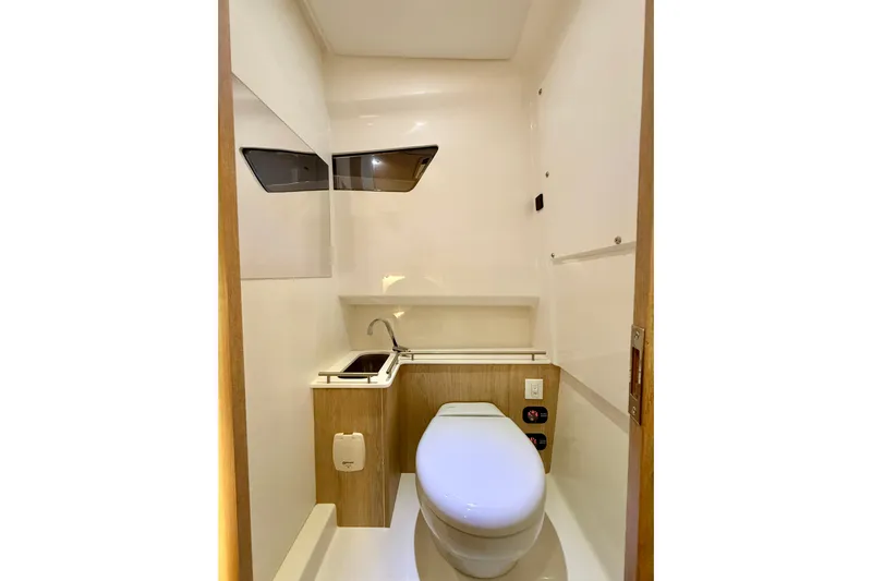  Yacht Photos Pics Compact modern bathroom in Zodiac X9CC 2026 model, featuring sleek design and efficient use of space.