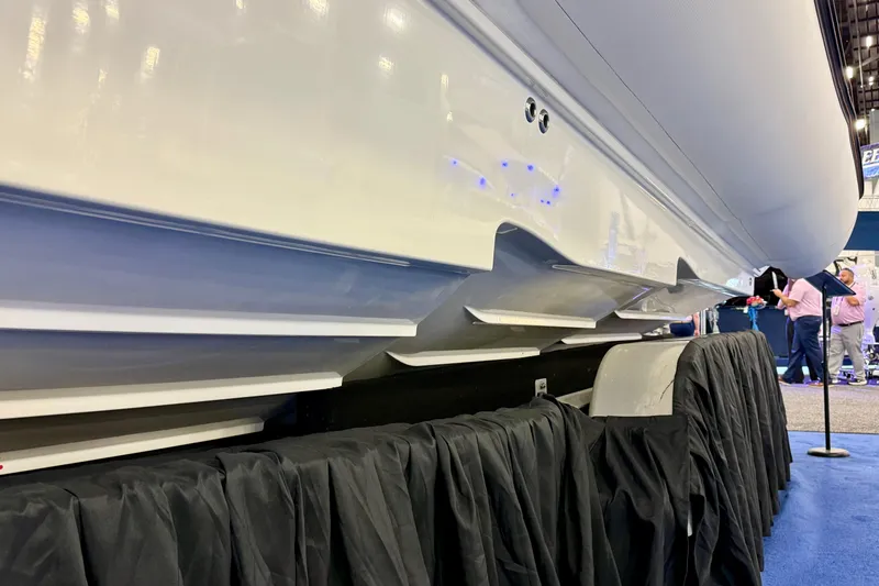  Yacht Photos Pics 2026 Zodiac X9CC boat hull displayed at an indoor exhibition.