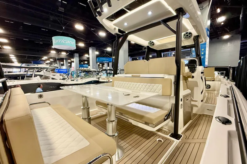  Yacht Photos Pics Luxurious Zodiac X9CC 2026 boat interior with beige seating and sleek design at a boat show.
