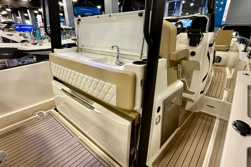  Yacht Photos Pics 2026 Zodiac X9CC boat interior with sink and seating, showcasing luxury design and functionality.