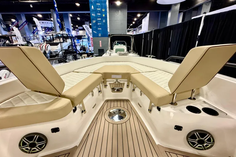  Yacht Photos Pics 2026 Zodiac X9CC boat interior with beige seating and modern design at a boat show.