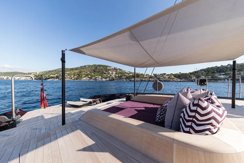 Ngoni Yacht Photos Pics Luxurious deck of Royal Huisman Dubois Mega Sloop 2017 with cushions and sunshade.