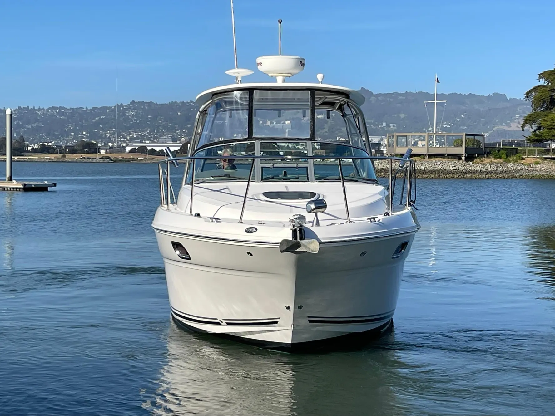 2005 Sea Ray Amberjack 290 boat on calm water, front view.