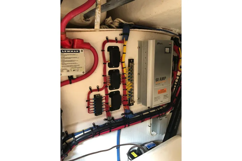 Mawe Yacht Photos Pics Electrical panel of a 2006 Island Packet 440 sailboat with wiring and components.
