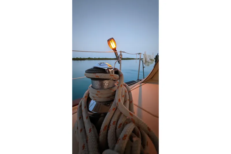 Mawe Yacht Photos Pics Sailing yacht Island Packet 440, 2006, with ropes and sunset view.