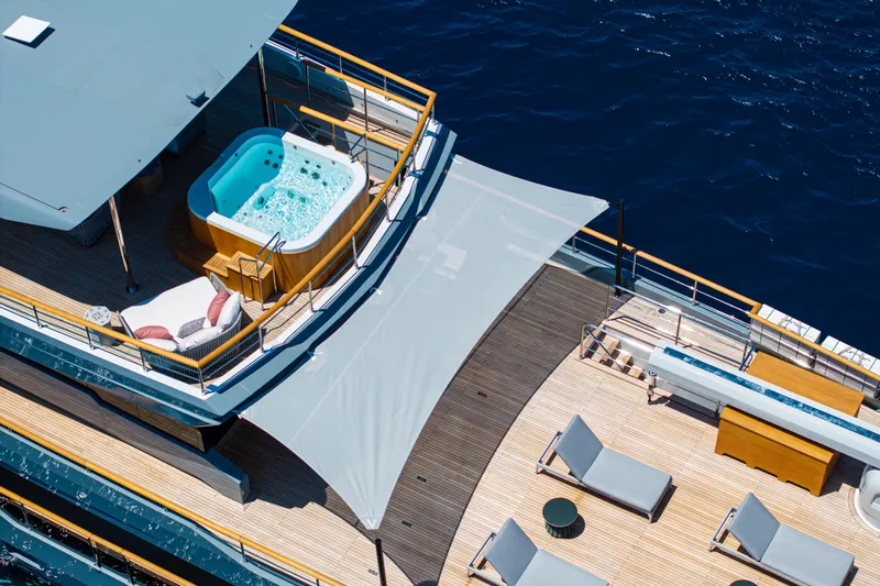 37xp-17 Yacht Photos Pics Luxurious 2026 Numarine 37XP-17 yacht deck with jacuzzi and sun loungers.