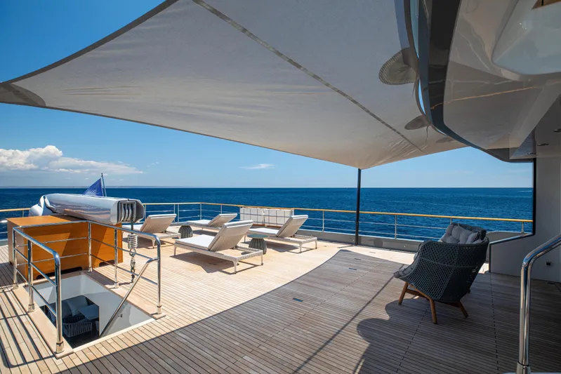 37xp-17 Yacht Photos Pics Luxurious deck of 2026 Numarine 37XP-17 yacht with ocean view and sun loungers.