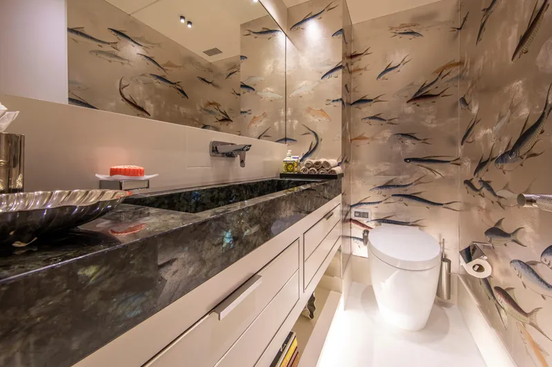 37xp-17 Yacht Photos Pics Luxurious bathroom in 2026 Numarine 37XP-17 yacht with fish-themed wall design.