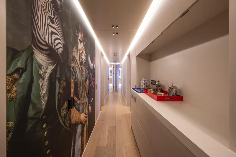 37xp-17 Yacht Photos Pics Luxurious hallway in 2026 Numarine 37XP-17 yacht with artistic animal portraits.