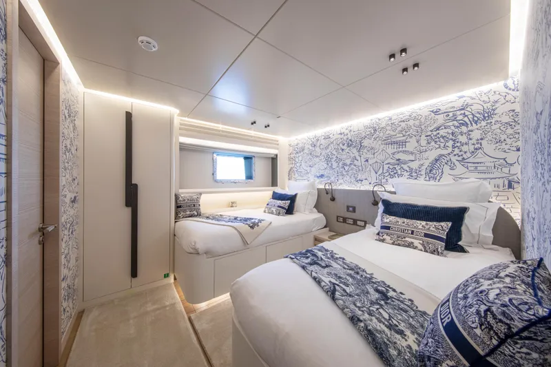 37xp-17 Yacht Photos Pics Luxurious cabin interior of 2026 Numarine 37XP-17 yacht with elegant bedding and artistic wall design.