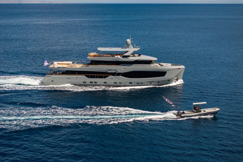 37xp-17 Yacht Photos Pics Luxury yacht Numarine 37XP-17, 2026 model, cruising alongside a smaller boat in open sea.