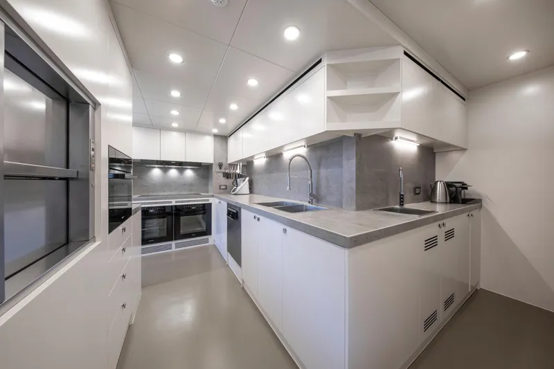 37xp-17 Yacht Photos Pics Modern kitchen interior on 2026 Numarine 37XP-17 yacht, featuring sleek design and appliances.