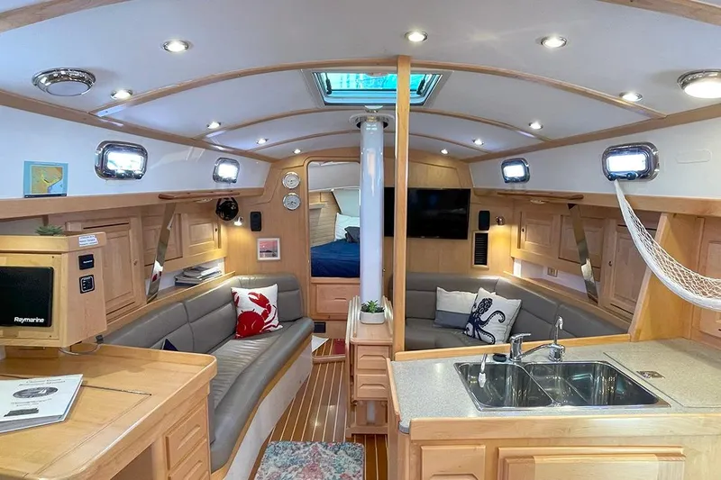 Stargazer Yacht Photos Pics Luxurious interior of 2019 Tartan 395 yacht with modern amenities and elegant design.