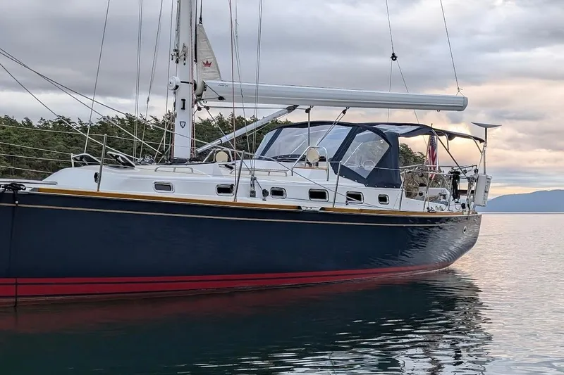 Stargazer Yacht Photos Pics 2019 Tartan 395 sailboat on calm water, featuring sleek design and modern rigging.