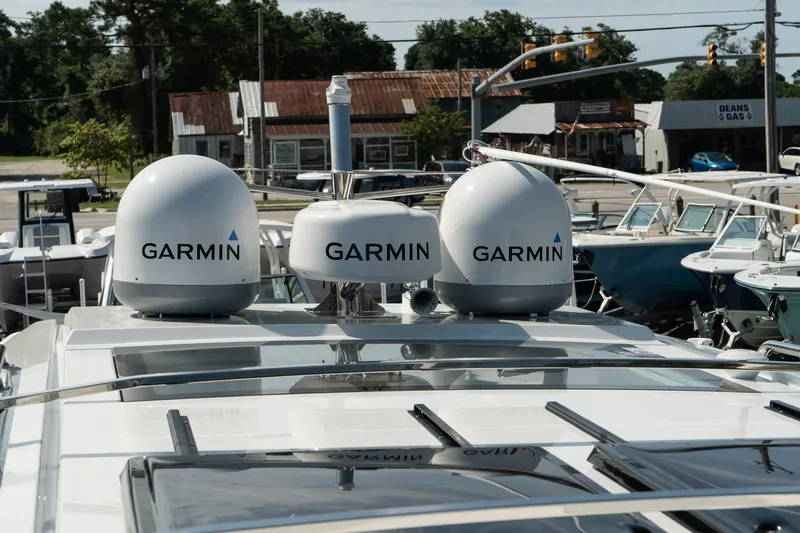 38 Explorer Yacht Photos Pics 2025 Wellcraft 355 boat with Garmin navigation equipment on deck.