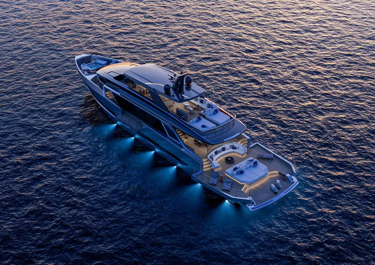 Viper 130 Yacht Photos Pics Luxurious 2027 ISA Viper 130 yacht illuminated on serene ocean waters at dusk.