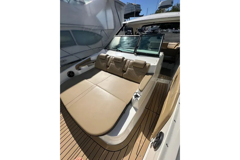  Yacht Photos Pics 2020 Sea Ray Sundancer 320 Outboard with tan seating and sleek design.