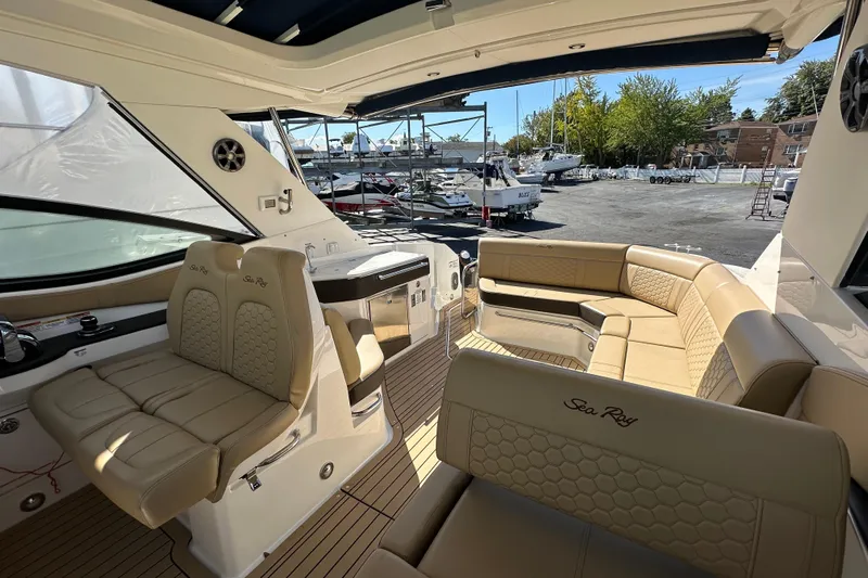  Yacht Photos Pics 2020 Sea Ray Sundancer 320 Outboard interior with luxurious seating and modern design.