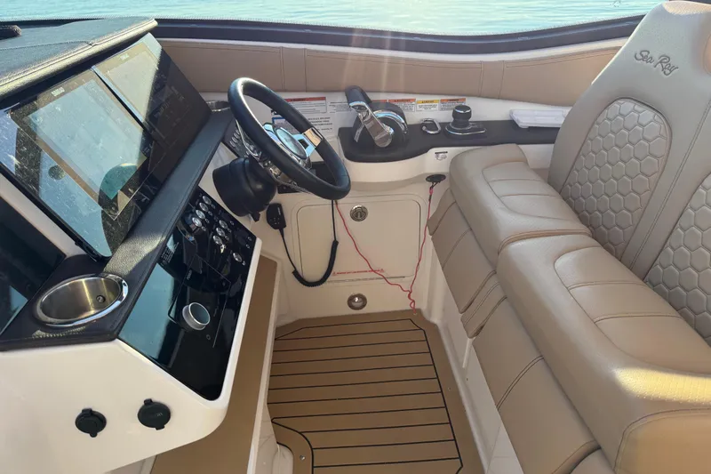  Yacht Photos Pics 2020 Sea Ray Sundancer 320 Outboard helm with modern controls and comfortable seating.