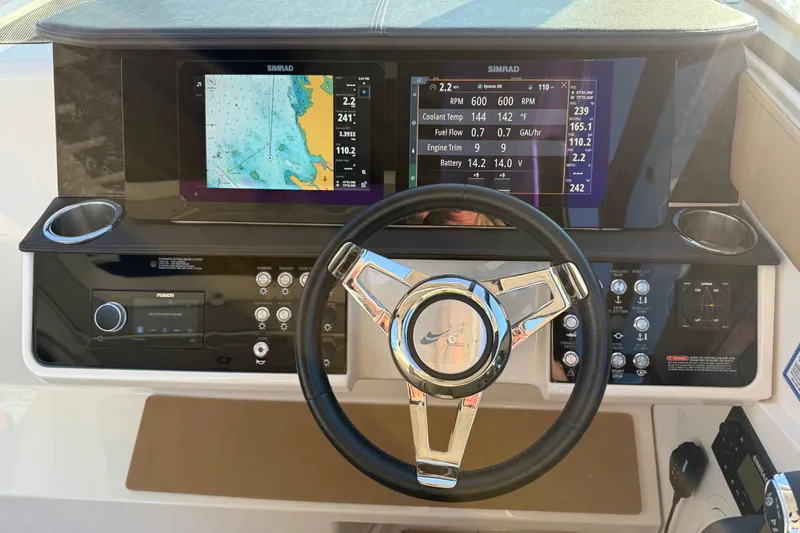 Yacht Photos Pics 2020 Sea Ray Sundancer 320 Outboard helm with navigation screens and controls.