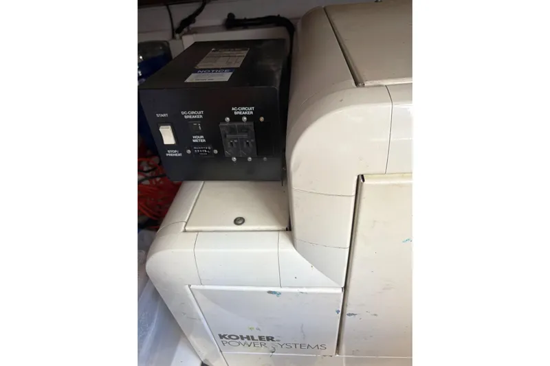 Pilot House Yacht Photos Pics Kohler power system unit on a 2003 Sealine F42/5 boat.