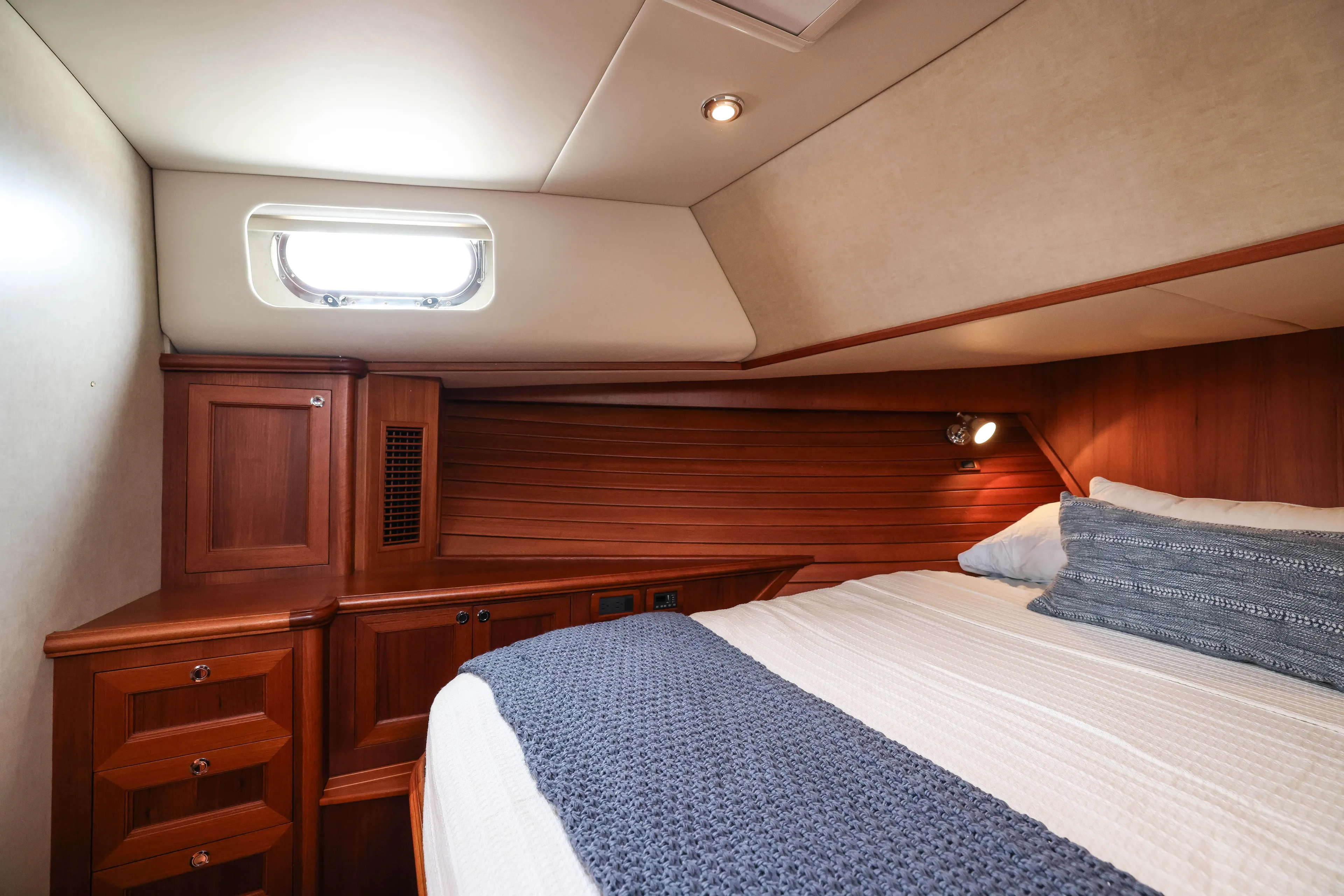 Aryeh Yacht Photos Pics Luxurious cabin interior of 2008 Grand Banks EASTBAY 39 SX yacht with wood finish.