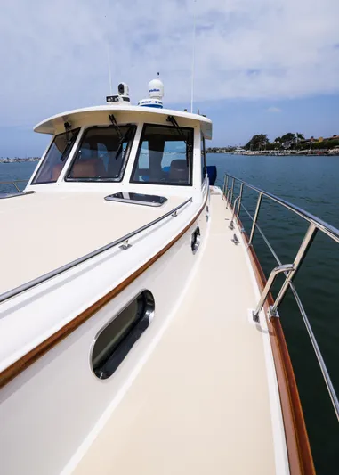 Aryeh Yacht Photos Pics 2008 Grand Banks EASTBAY 39 SX yacht on calm water, showcasing sleek design and craftsmanship.