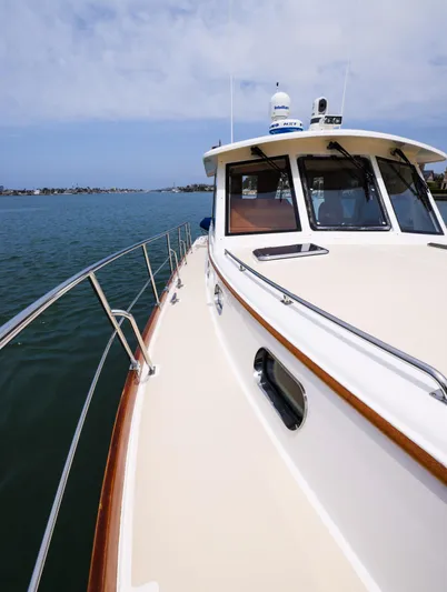 Aryeh Yacht Photos Pics 2008 Grand Banks EASTBAY 39 SX yacht on calm water, showcasing sleek design and craftsmanship.