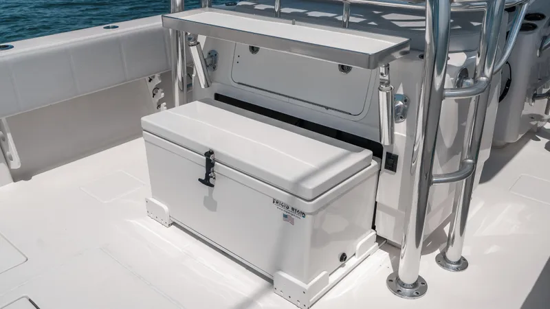  Yacht Photos Pics 2023 Contender 39 ST boat deck with storage and seating area.