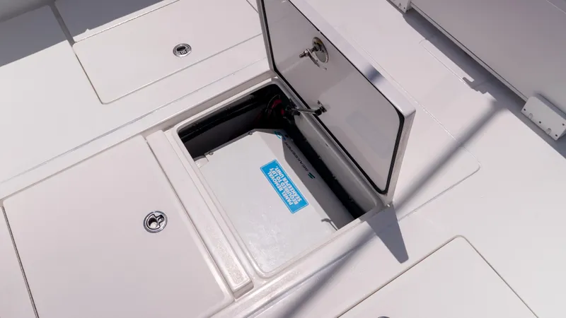  Yacht Photos Pics Open storage compartment on 2023 Contender 39 ST boat deck.