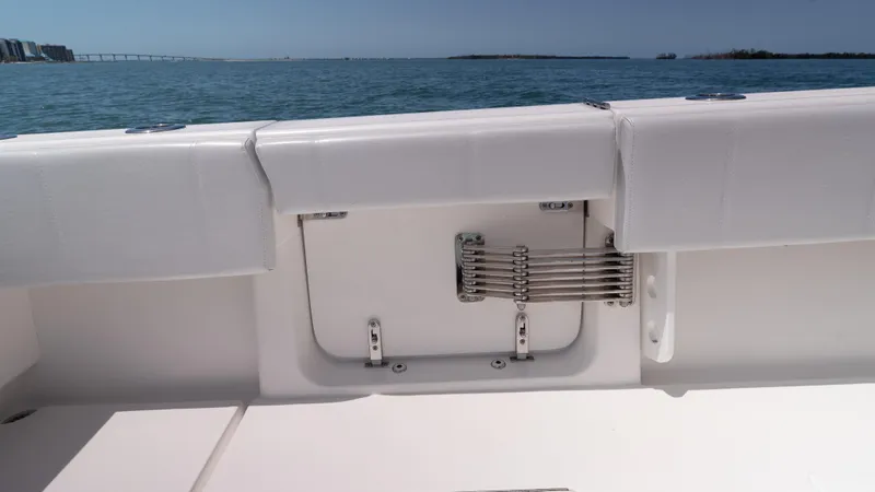 Yacht Photos Pics 2023 Contender 39 ST boat interior with ocean view and seating area.