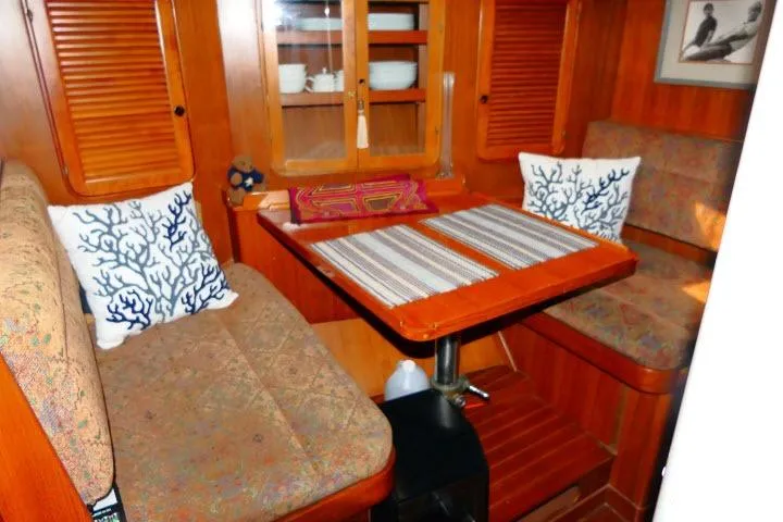 Avenir Yacht Photos Pics Cozy 1982 Ta Shing Mason 63 yacht interior with dining area and nautical decor.