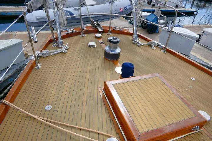 Avenir Yacht Photos Pics 1982 Ta Shing Mason 63 yacht deck with wooden finish and nautical equipment.