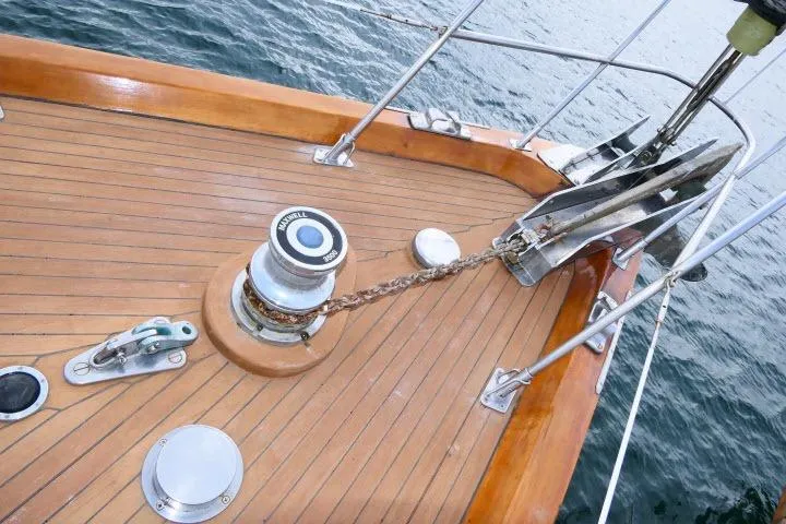 Avenir Yacht Photos Pics Deck of 1982 Ta Shing Mason 63 yacht with anchor chain and winch.